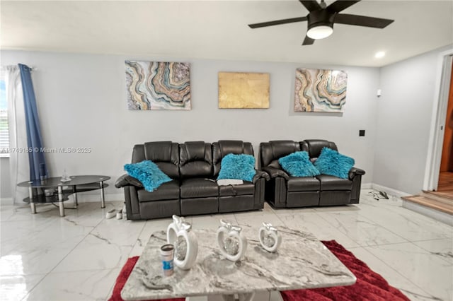 living room featuring recessed lighting, baseboards, marble finish floor, and ceiling fan