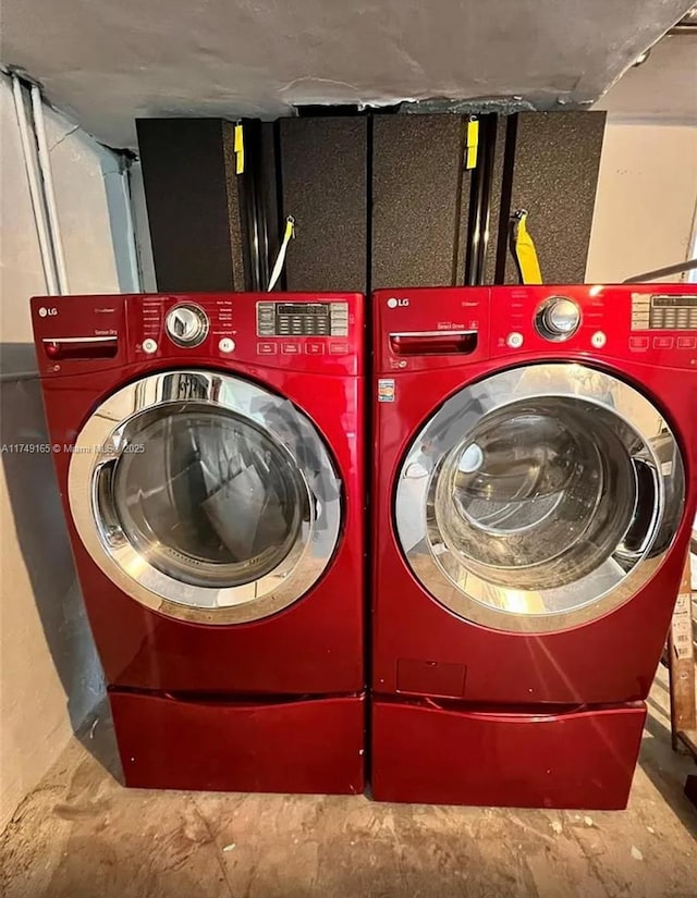 washroom with laundry area and separate washer and dryer