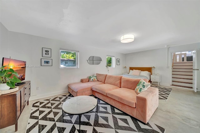 bedroom featuring baseboards