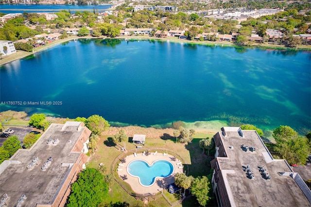 drone / aerial view with a water view