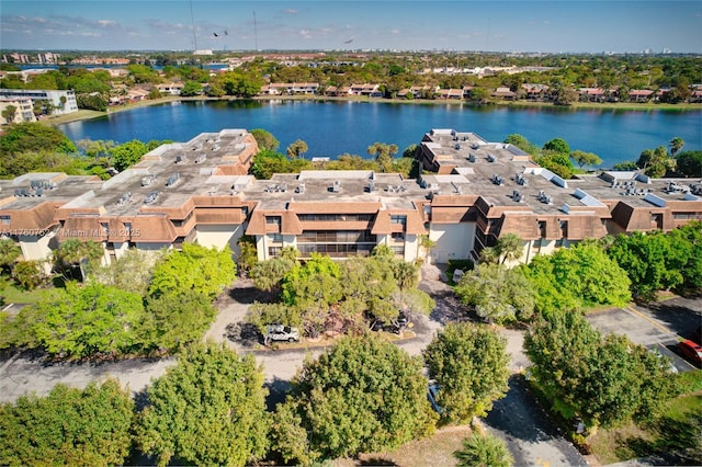 bird's eye view featuring a residential view and a water view