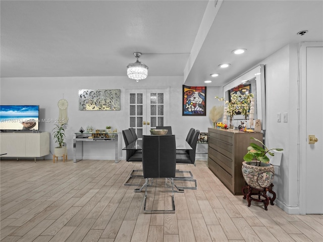 dining area with recessed lighting, french doors, and wood finished floors