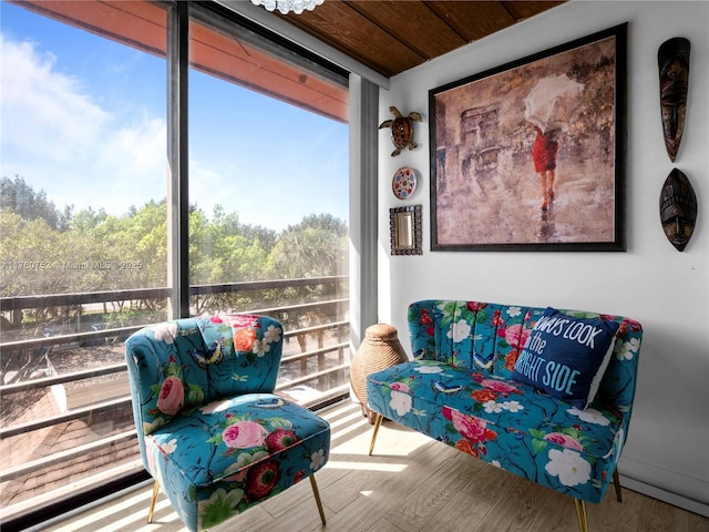 sunroom / solarium featuring wooden ceiling