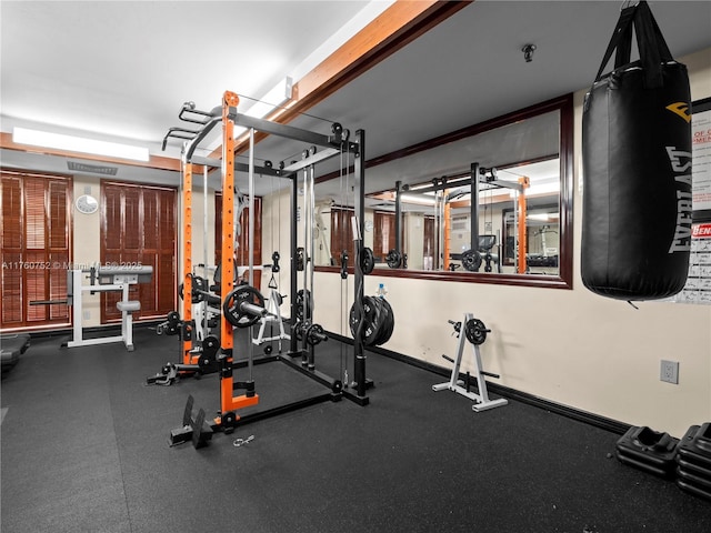 workout area with baseboards