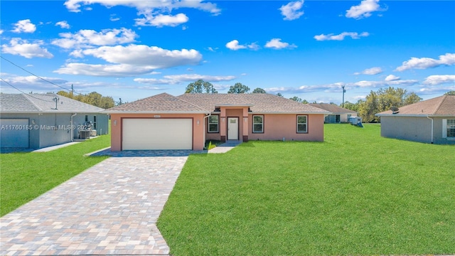 single story home with stucco siding, an attached garage, decorative driveway, and a front lawn