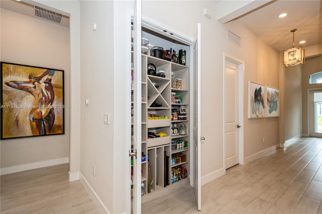 closet featuring visible vents