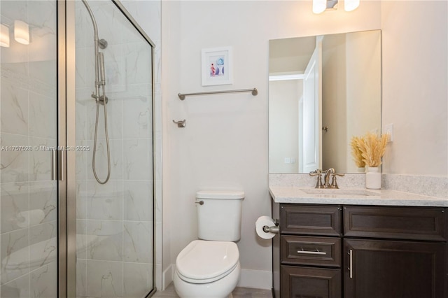 bathroom with a marble finish shower, toilet, and vanity