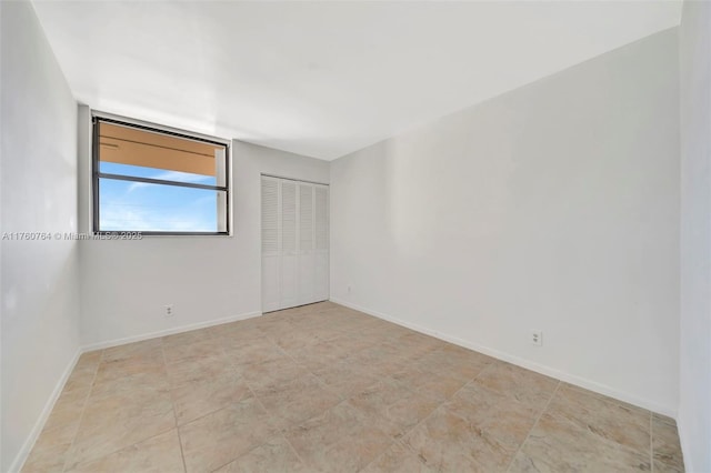 117 Lake Emerald Dr Unit 408, Oakland Park, FL 33309 - unfurnished room featuring baseboards