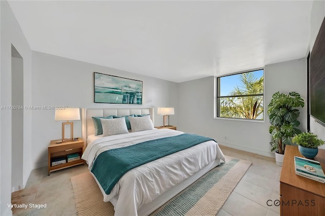 117 Lake Emerald Dr Unit 408, Oakland Park, FL 33309 - bedroom featuring baseboards and light tile patterned floors