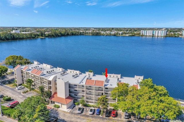 117 Lake Emerald Dr Unit 408, Oakland Park, FL 33309 - drone / aerial view of a nearby body of water and apartment complex