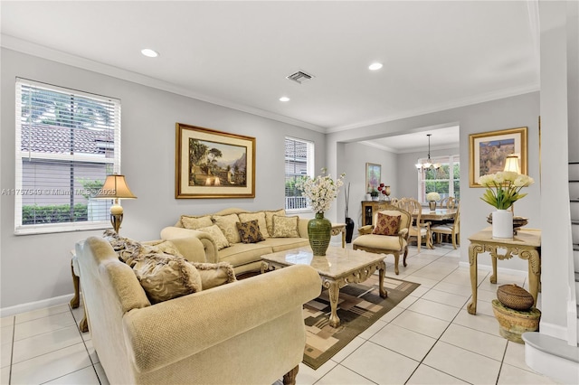 living room featuring visible vents, a healthy amount of sunlight, ornamental molding, and light tile patterned flooring