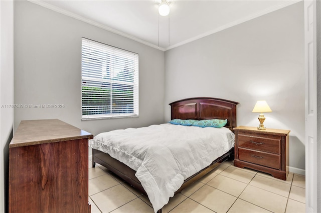 bedroom with baseboards, ornamental molding, and light tile patterned flooring