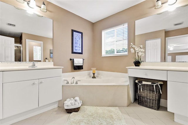 bathroom with vanity, visible vents, a shower stall, tile patterned floors, and a bath