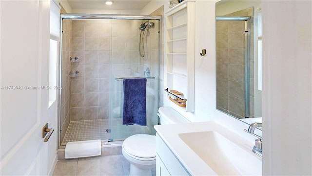 1040 SE 24th Ave, Homestead, FL 33035 - bathroom featuring vanity, a shower stall, toilet, and tile patterned floors