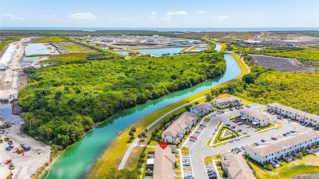 bird's eye view with a water view