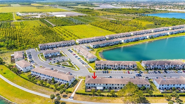 drone / aerial view with a water view