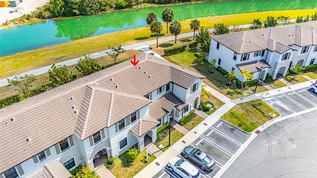 drone / aerial view with a water view