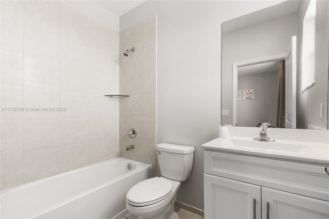 full bath featuring toilet, bathtub / shower combination, and vanity