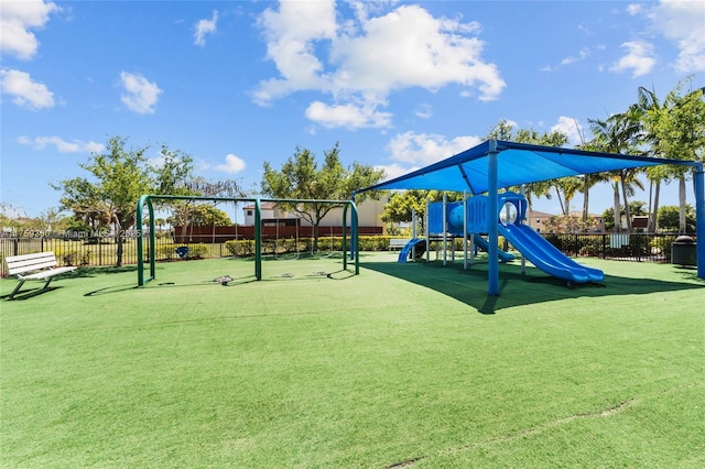 community jungle gym featuring fence