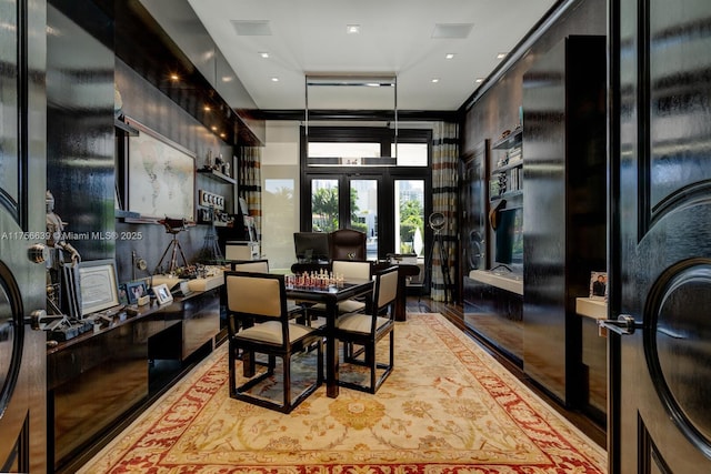 dining room with french doors and wood finished floors