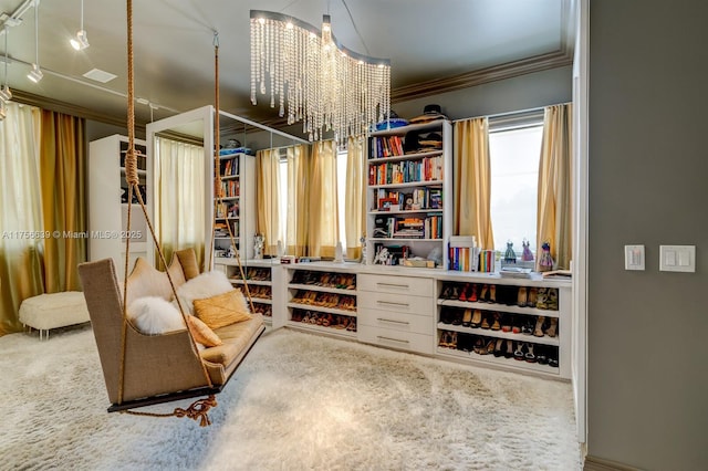 living area with carpet flooring, crown molding, and an inviting chandelier