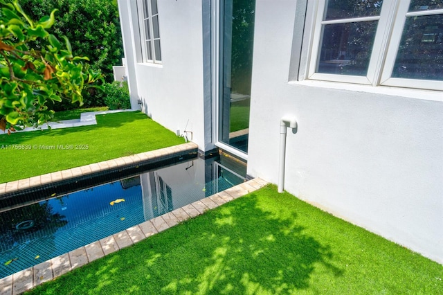 pool featuring a yard