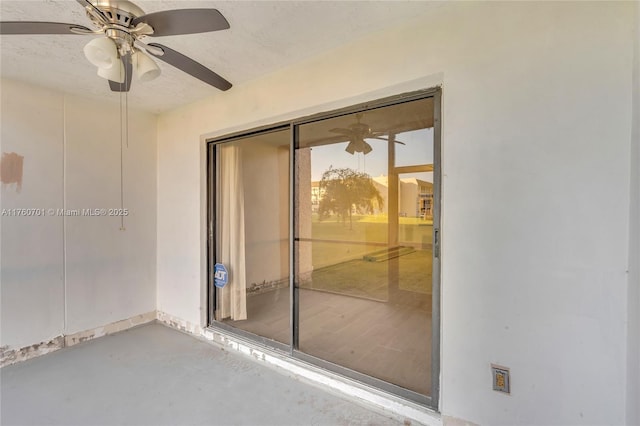 interior space featuring a ceiling fan