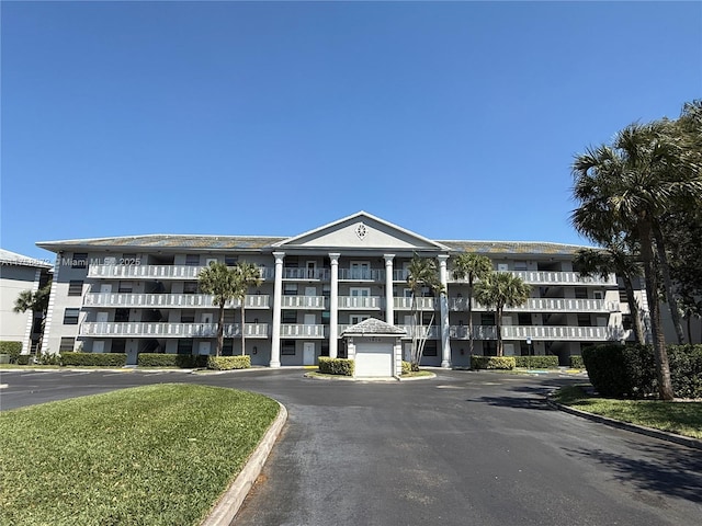 1504 S Whitehall Dr Unit 206, Davie, FL 33324 - view of apartment building / complex featuring a garage and driveway