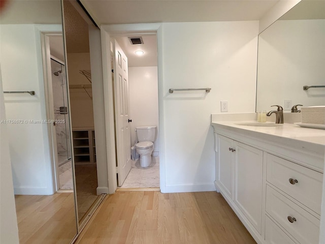 1504 S Whitehall Dr Unit 206, Davie, FL 33324 - full bathroom with wood finished floors, vanity, and a spacious closet