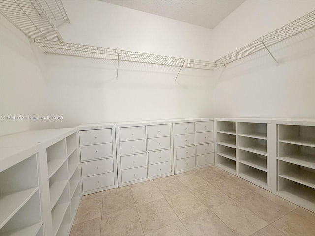 1504 S Whitehall Dr Unit 206, Davie, FL 33324 - walk in closet with light tile patterned floors