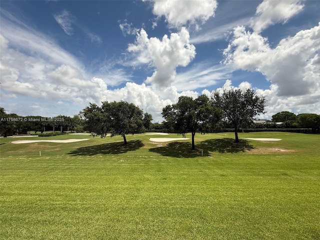 1504 S Whitehall Dr Unit 206, Davie, FL 33324 - surrounding community with golf course view and a yard