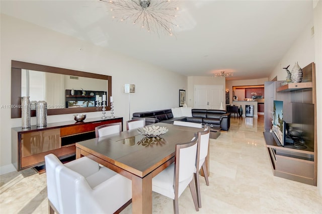 dining room with an inviting chandelier