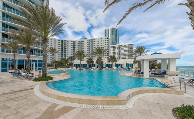 pool featuring a gazebo and a patio area