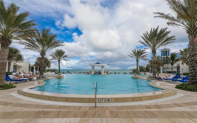 community pool with a patio