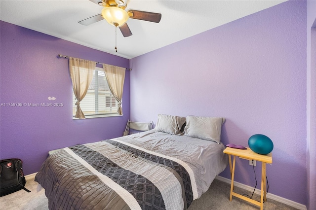 bedroom with carpet floors, baseboards, and ceiling fan