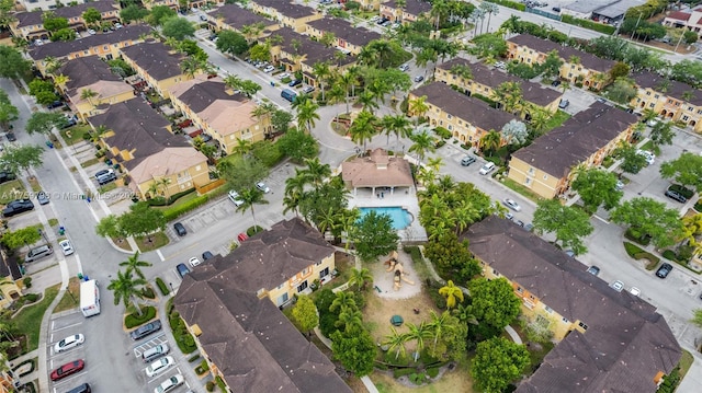 birds eye view of property with a residential view
