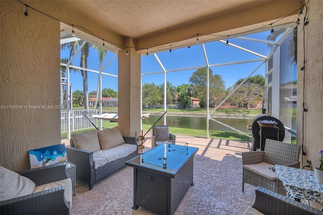 sunroom with a water view