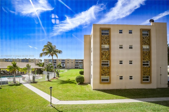 view of property featuring a community pool