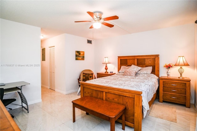 bedroom with a ceiling fan, visible vents, baseboards, a closet, and marble finish floor