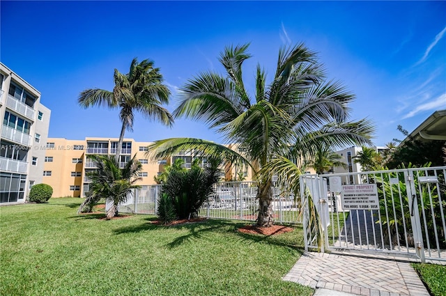 view of yard featuring a gate and fence