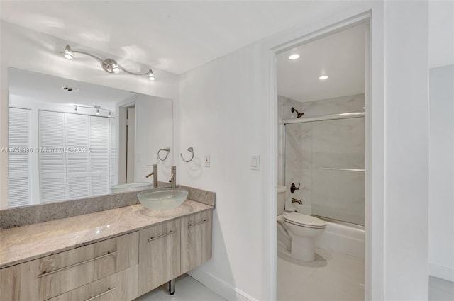 full bathroom with an enclosed shower, visible vents, toilet, baseboards, and vanity