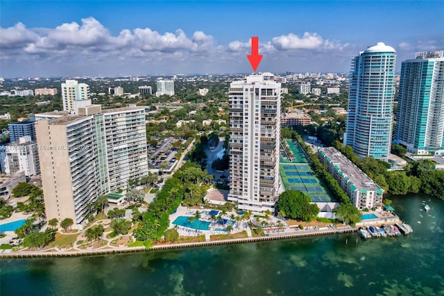 drone / aerial view with a view of city and a water view