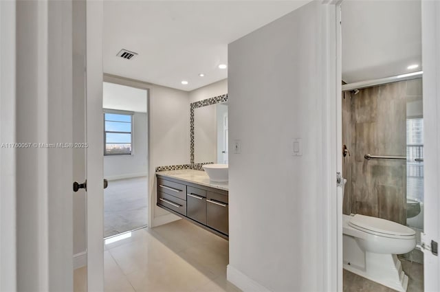 bathroom featuring vanity, visible vents, recessed lighting, an enclosed shower, and toilet