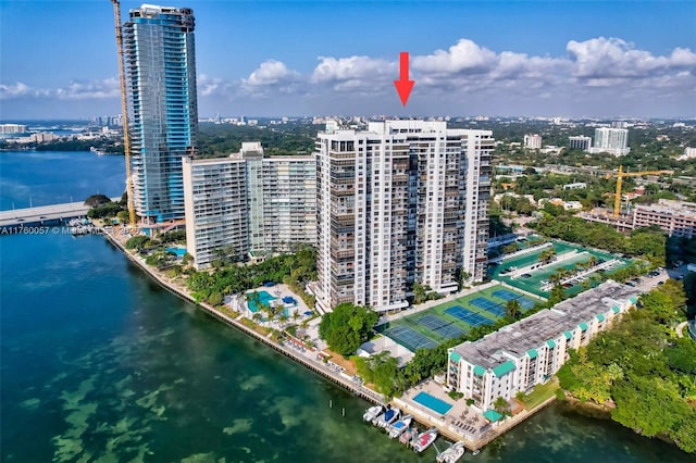 aerial view featuring a city view and a water view