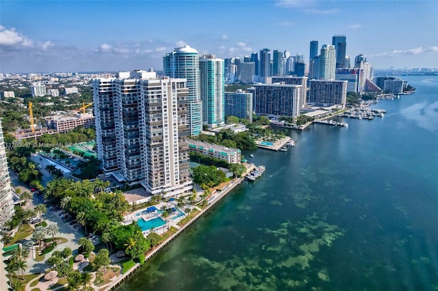 drone / aerial view with a view of city and a water view