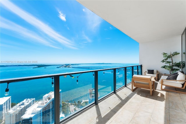 1451 Brickell Ave Unit 4002, Miami, FL 33131 - balcony featuring a water view and an outdoor living space