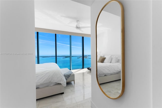 1451 Brickell Ave Unit 4002, Miami, FL 33131 - bedroom featuring light marble finish flooring, a water view, and a ceiling fan