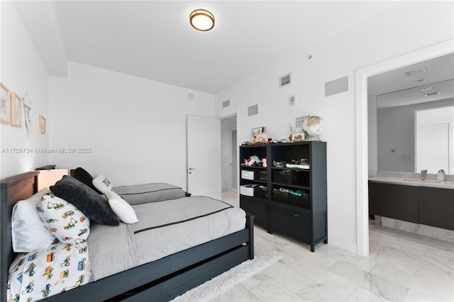 1451 Brickell Ave Unit 4002, Miami, FL 33131 - bedroom with a sink, light marble finish flooring, and ensuite bath