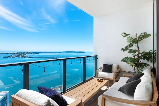 1451 Brickell Ave Unit 4002, Miami, FL 33131 - balcony featuring a water view and an outdoor living space