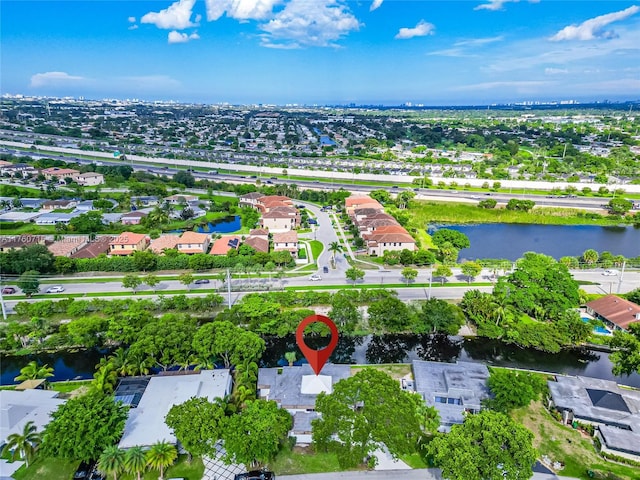 aerial view with a residential view and a water view